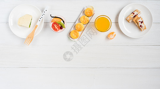 鲜榨橙汁糕点美食组合背景
