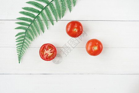 绿色卡通植物餐桌上的食物摆盘背景