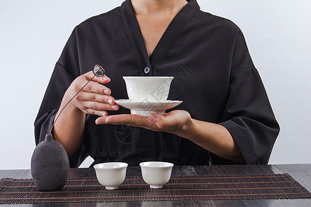 手端茶杯 茶文化背景图片