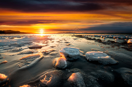 冬季美景夕阳下的海冰风景背景