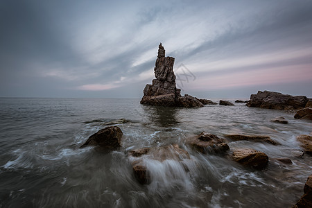 旅顺将军石落日涌浪将军石背景