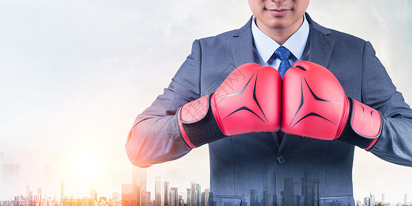戴拳击手套的商务男女随时准备战斗的概念设计图片