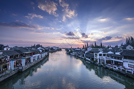 夕阳下的江南古镇小桥流水背景图片