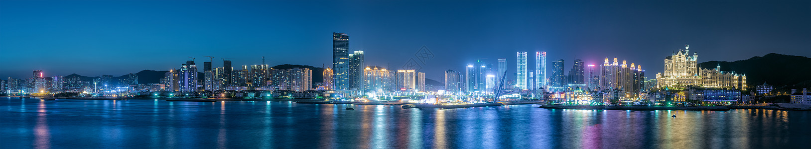 夜晚海城市建筑风光背景