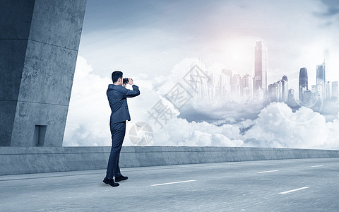 站在桥上观看云层商务男士背景图背景图片