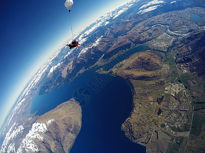 新西兰留学新西兰皇后镇极限运动跳伞航拍风景照背景