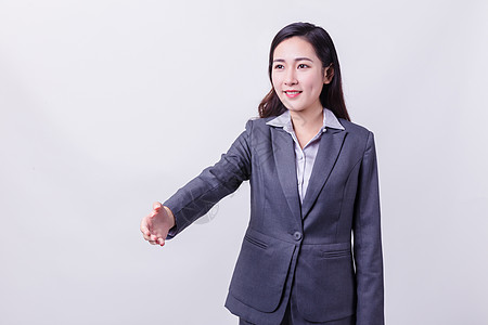 青春握手职业女性合作握手形象背景
