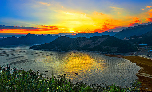 霞浦紫菜金色的海上日落背景