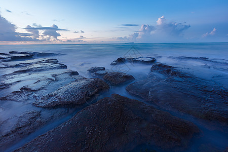 涠洲岛五彩滩的日出背景图片