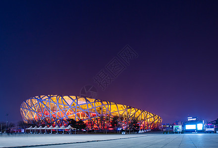 体育馆灯光鸟巢夜景背景