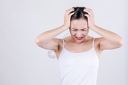 头痛的女人居家女人表现头痛情绪背景
