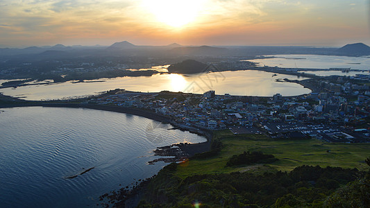 韩国城山日出峰观景台观日落背景