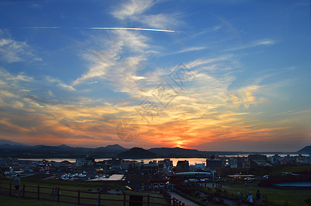 韩国城山日出峰观景台观日落背景
