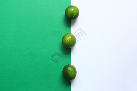 绿色白色撞色青柠檬背景图背景图片