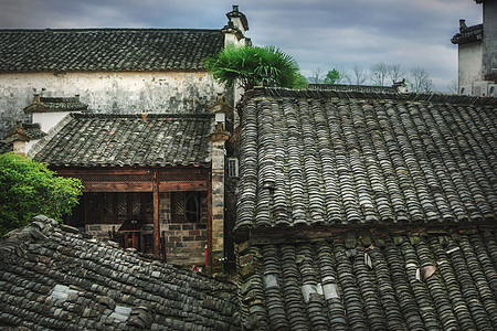 白墙乌瓦有吧台的徽州老房子背景