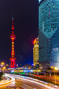 川流不息的街道上海东方明珠夜景背景图背景