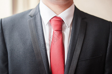 领结领带穿西装的男人背景