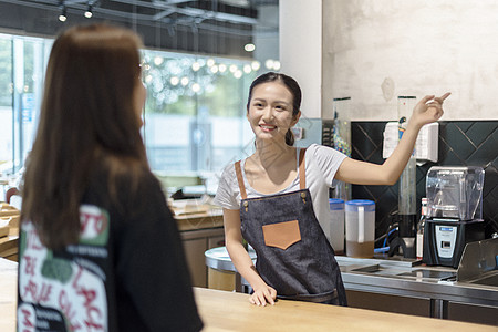 奶茶背景女服务生服务指引背景