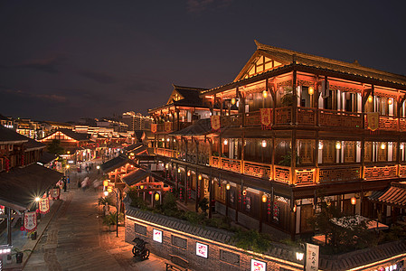 夜景街道夜幕下的古镇背景