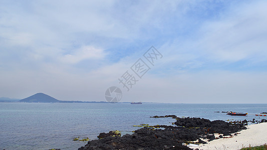 韩国济州岛牛岛海边自然风光背景图片