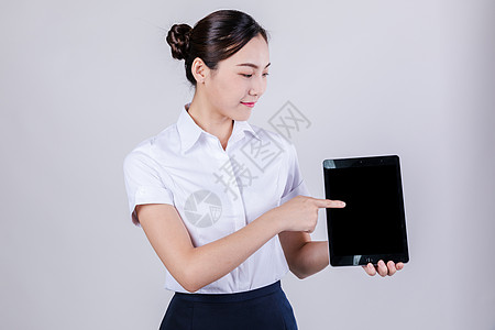 职业女性用平板电脑棚拍高清图片