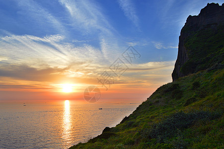 韩国济州岛城山日出峰日出唯美照片背景