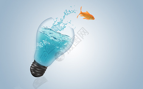 金鱼跳出灯泡创意背景图片