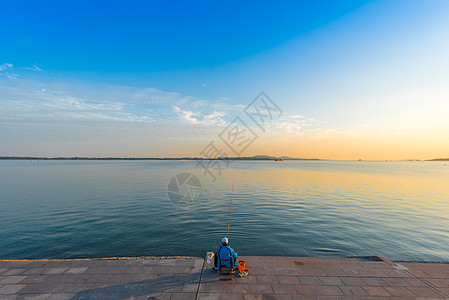 青岛海边日落最美夕阳背景图片