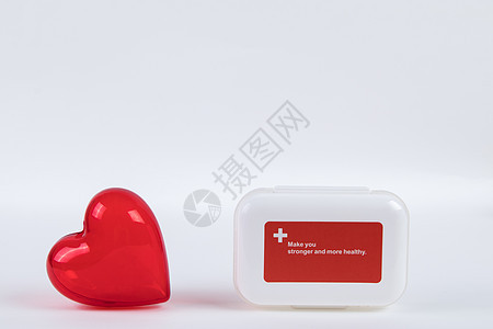 爱心和药盒背景图片