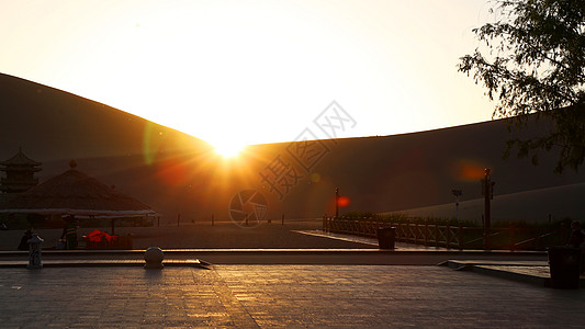 敦煌鸣沙山夕阳背景