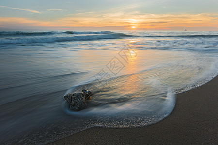 大海波浪涠洲岛海边霞光背景