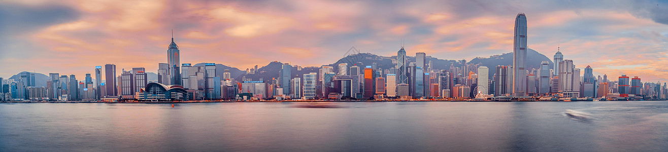 仰视高楼香港维多利亚湾日出背景