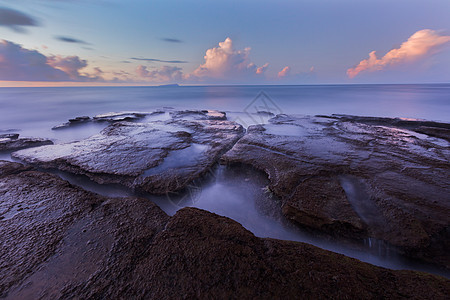 涠洲岛海边礁石背景图片