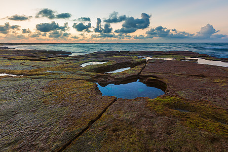 晚霞风景涠洲岛海边礁石背景