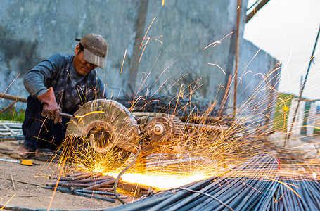 工具工人建筑工人切割钢材背景