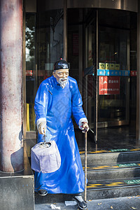 路边商店北京路边的雕塑背景