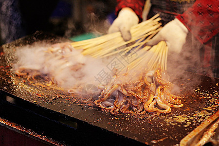 烤鱿鱼食物烤鱿鱼高清图片