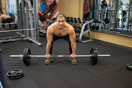 无氧杠铃运动男性健身房运动锻炼背景