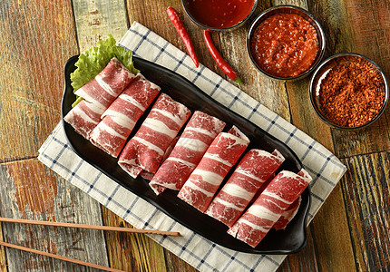 火锅涮牛肉培根肉片高清图片