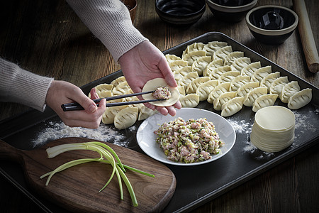 包饺子煮饺子擀面杆高清图片