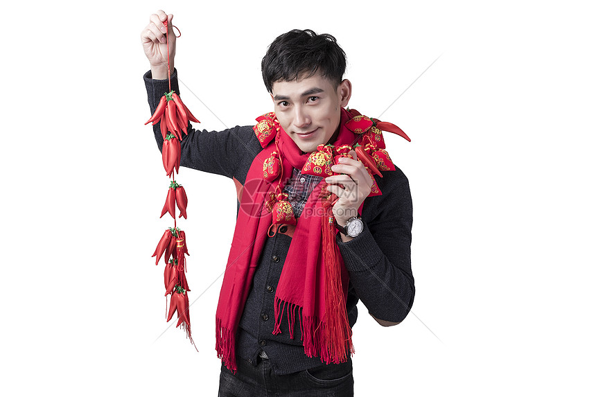 春节喜庆男士人像手持红辣椒图片