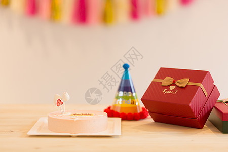 礼物盒大促销生日聚会礼物和蛋糕背景
