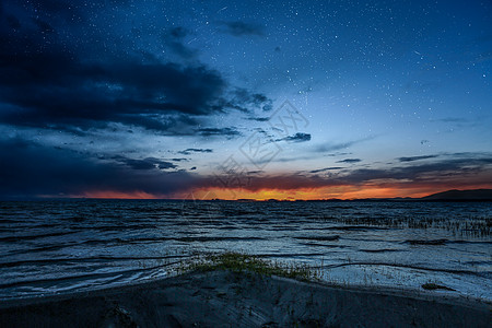 太阳星空克鲁克湖夕阳星空摄影背景