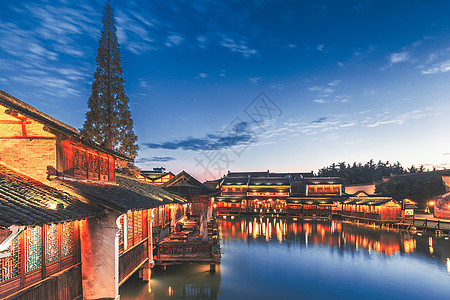 江南古镇夜景乌镇日落晚霞背景