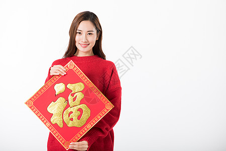 新年女性拿福字白底棚拍高清图片