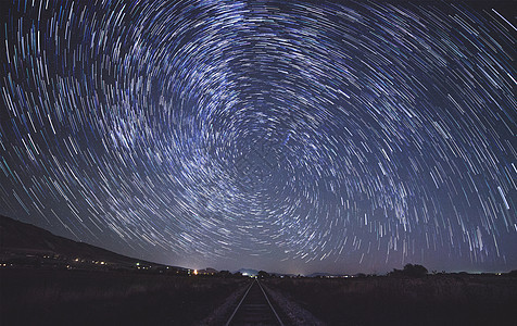 铁路天空星轨背景背景图片