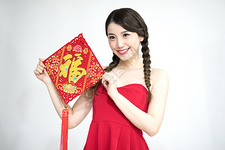 拿着中国结的新年女性图片