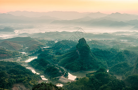 日出丹霞山山乡晨雾背景