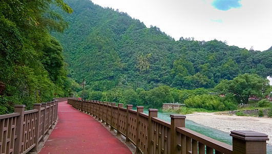 慢跑道青山绿水间的跑道绿道背景