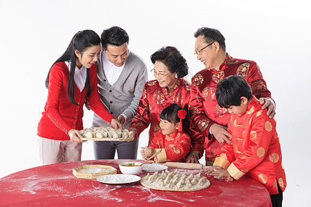 新年剪纸新年一家人包饺子背景